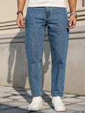 Men's jeans are made of classic blue denim fabric with a loose fit, making them an indispensable versatile item in the wardrobe. - trendingshoping.com